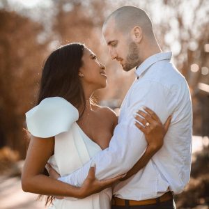 newly wed couple embracing