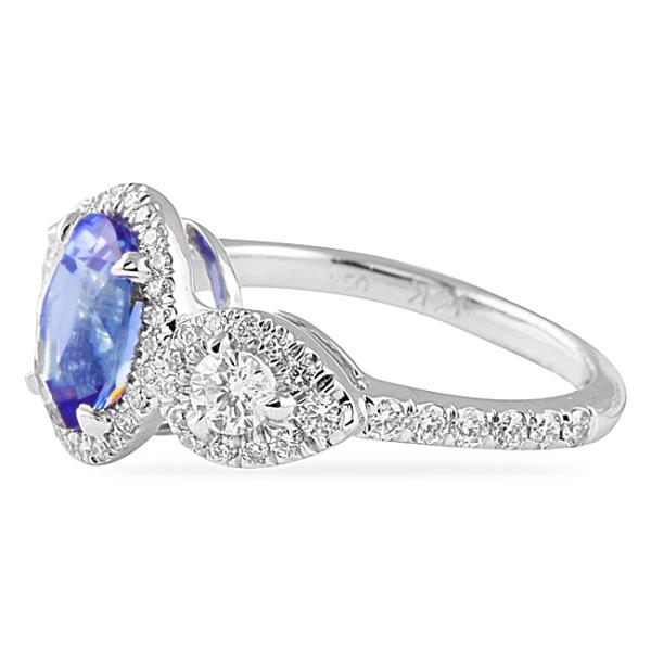 2.24 carat Oval Sapphire and Diamond Halo Three-Stone Ring