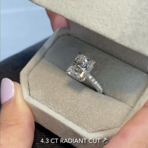 4.31 carat Radiant Diamond Three Row Engagement Ring