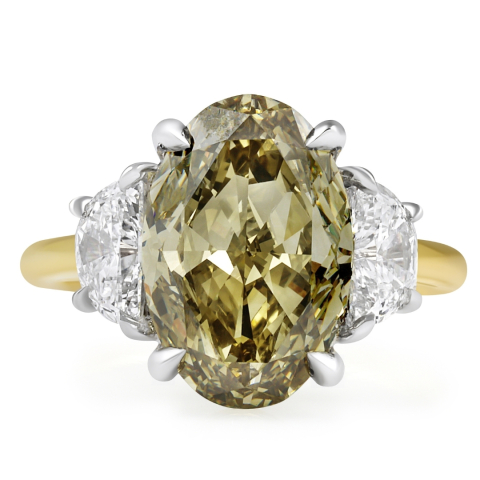 5.02 carat Fancy Color Oval Diamond Three Stone Ring flat