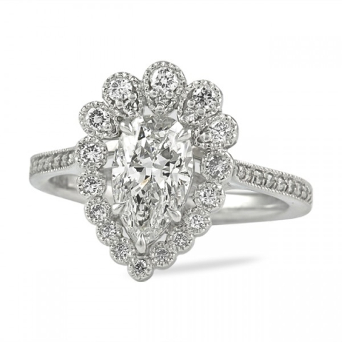 bezel set diamond halo engagement ring